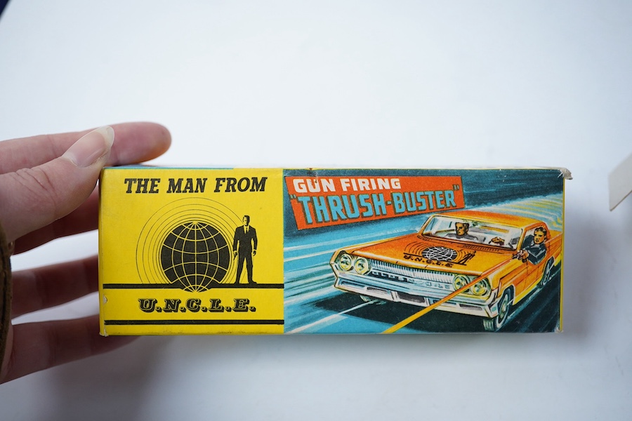 A boxed Corgi Toys (497) Man From Uncle boxed Thrush-Buster, Oldsmobile super 88, together with the Waverly ring, and inner card display stand. Condition - good.